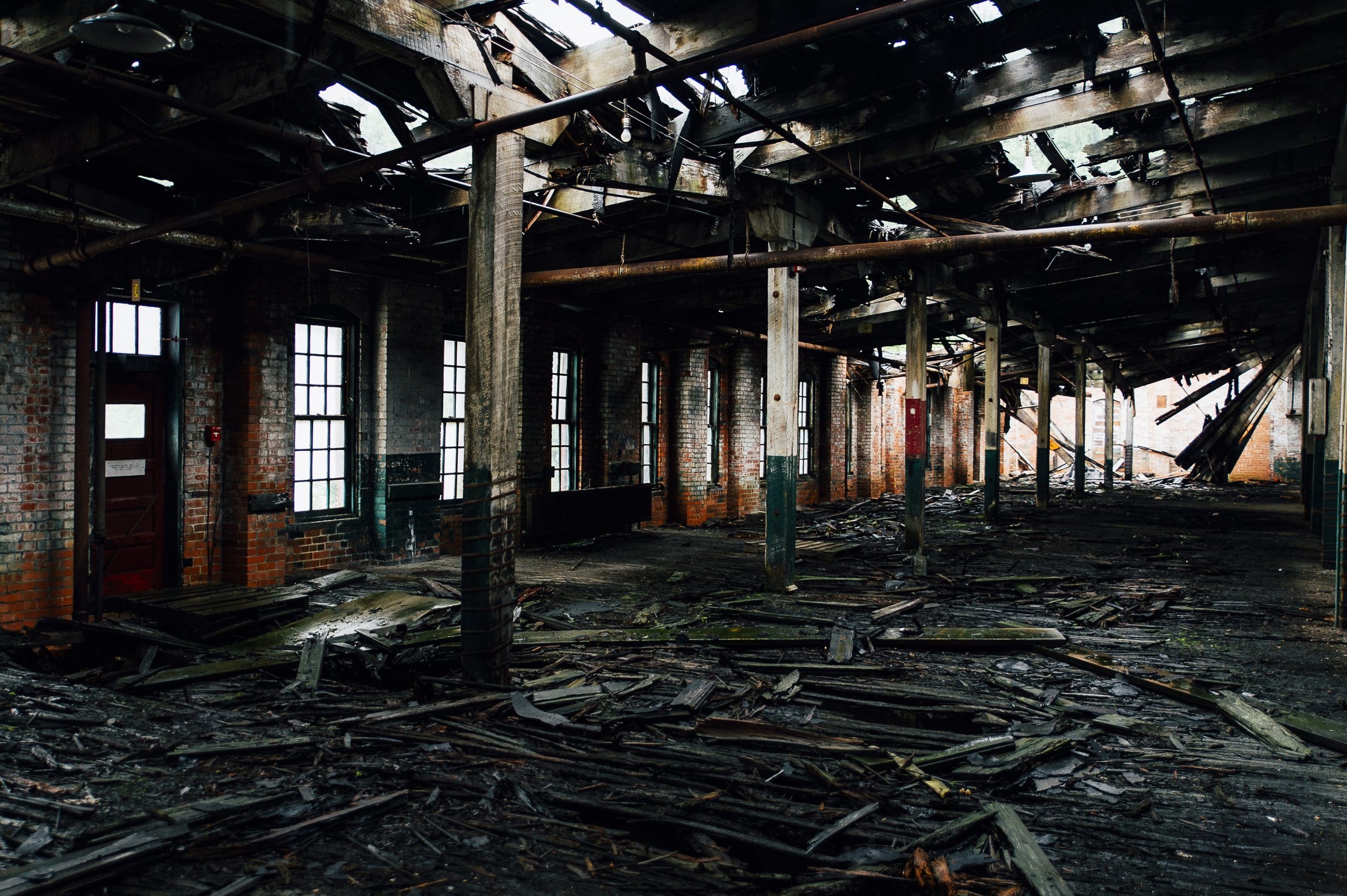 abandoned factor interior with wood debris